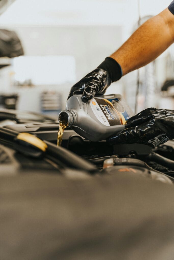 premium oil service with gloves close up